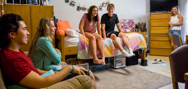 Students gathering in a residence hall
