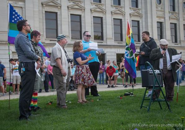 Ahmed Abdelmageed, Pharm.D., director of Experiential Education in the Pharmacy Program, far left, spoke at a peace vigil in Fort Wayne a day after the mass shooting in Orlando.