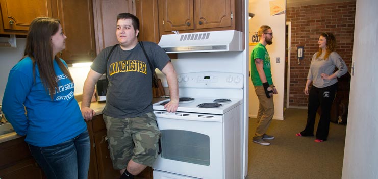 Students at a residence hall kitchen