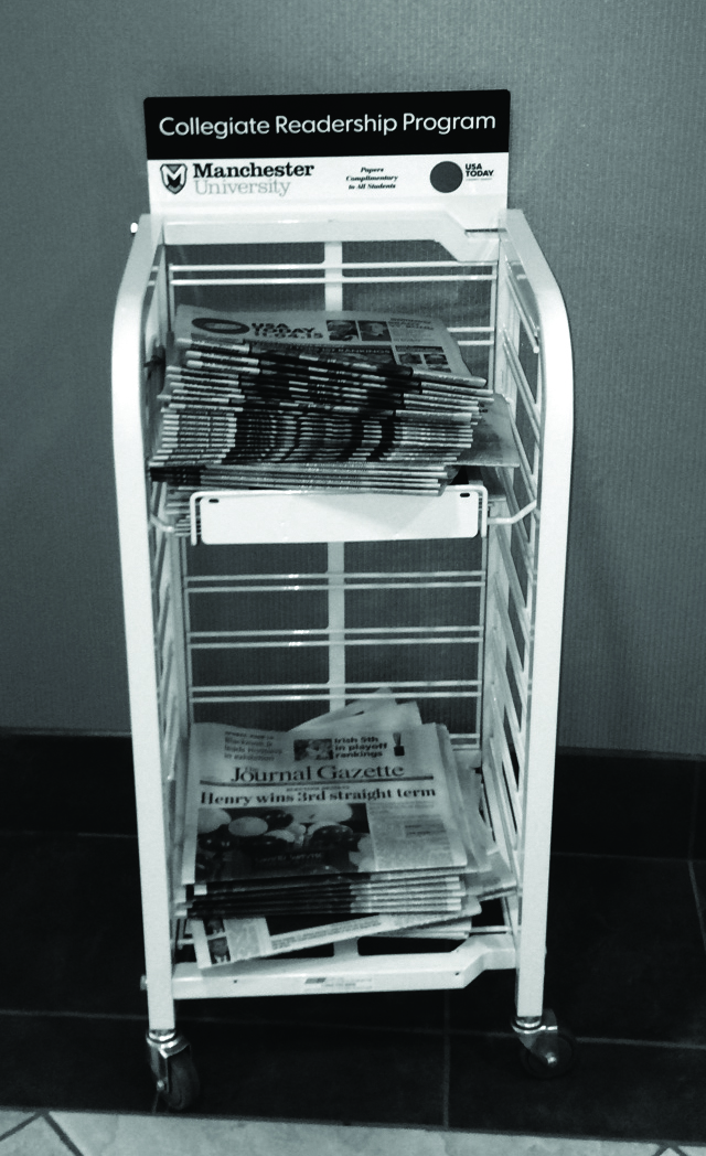 Newspaper rack in Science Center