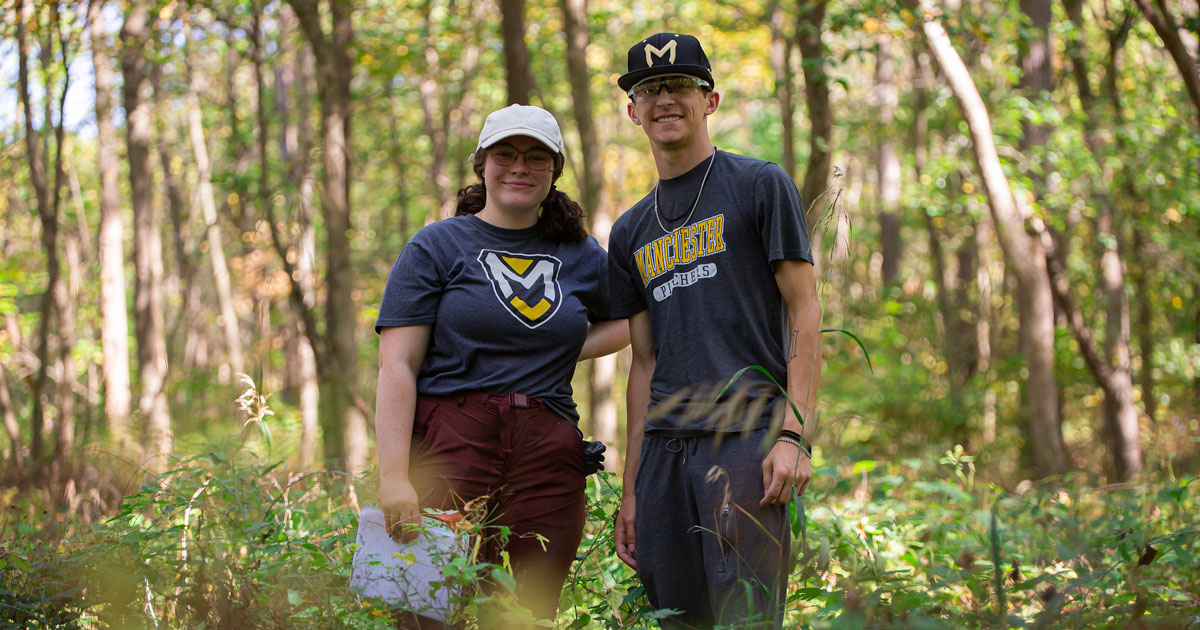 Student working together during a lab at a local nature preserve.