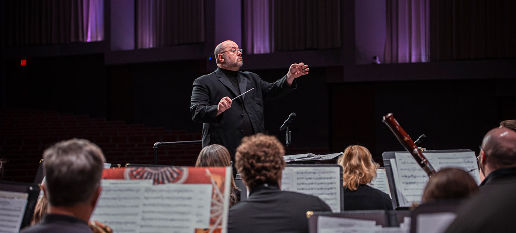 Dr Humphries conducting the symphonic band