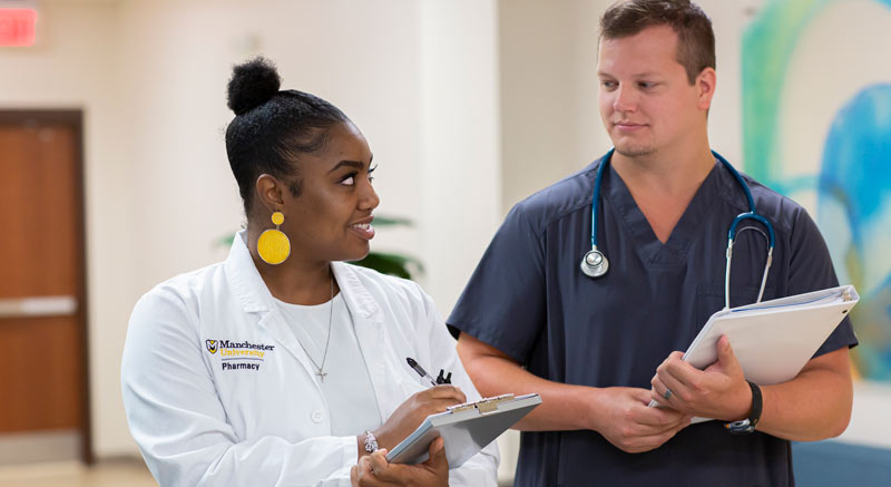 Pharmacist consults with patient