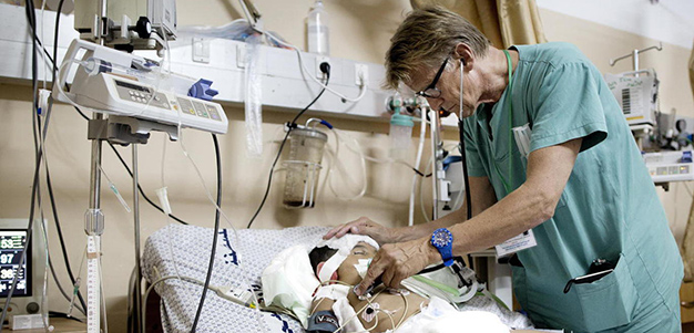 Dr. Mads Gilbert and patient