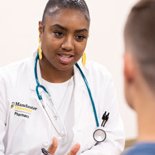 Pharmacist consults with patient