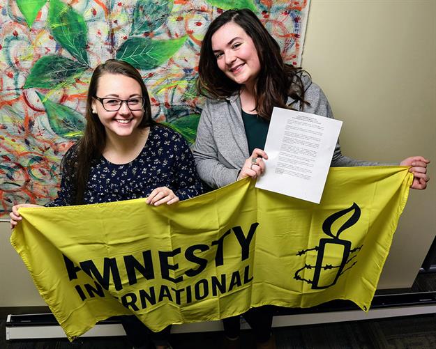 Gabby Anglin (Student Senate President) and Virginia Rendler (MU Amnesty International Chapter President)
