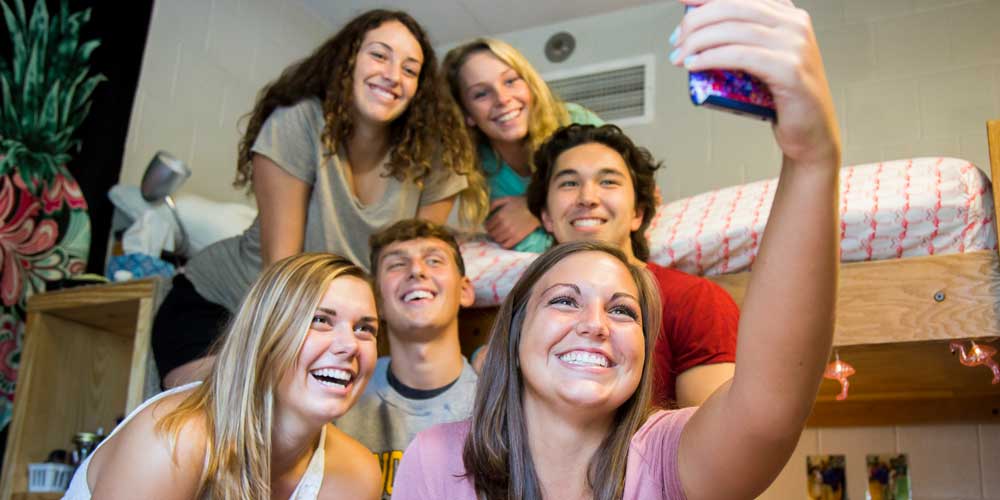 Students hang out together on campus during the NxtGen Camp week at MU.