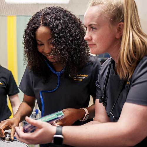 A student checking vital signs