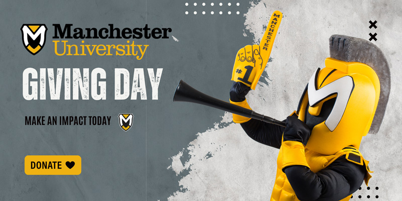 Image celebrates Giving Day at MU with Manny blowing a horn holding a We're Number 1 foam finger and invites everyone to make a donation