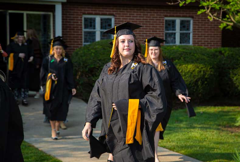 A portrait of a 2023 graduate from MU