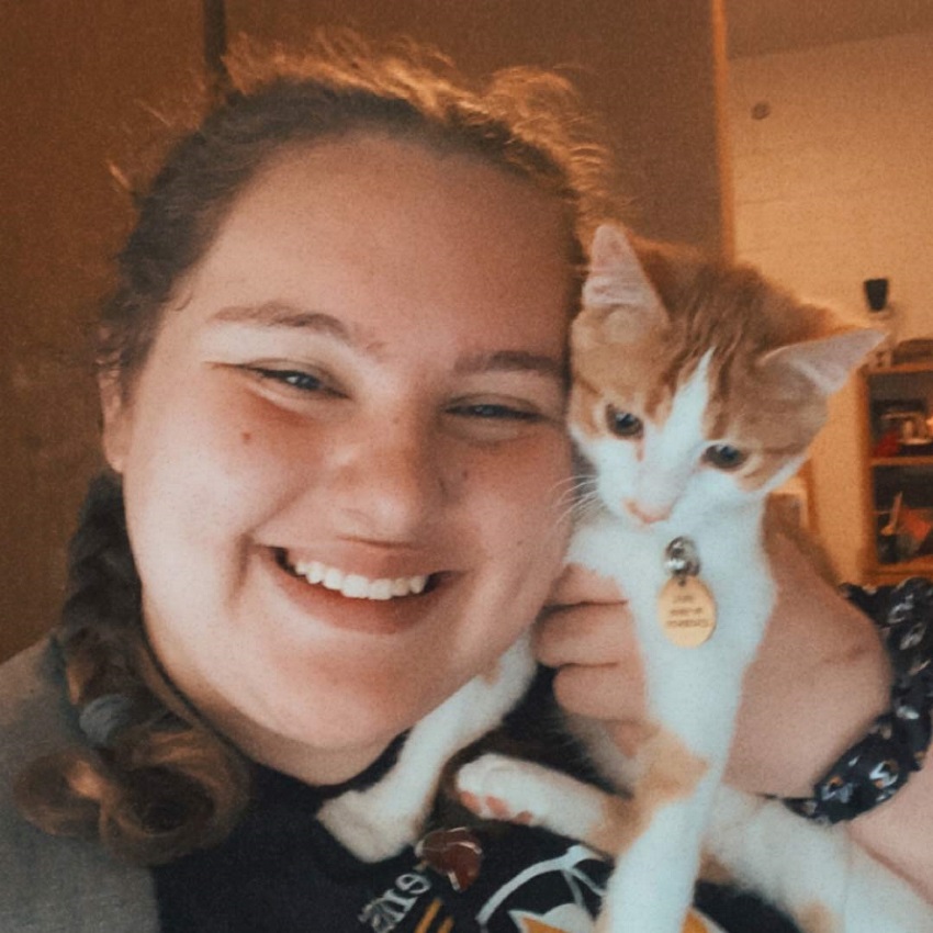 Image of Kyla and her Kitten