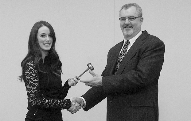 Alexis Young passes the Chamber gavel to Chris Garber in January 2015. Alexis Young passes the Chamber gavel to Chris Garber in January 2015.