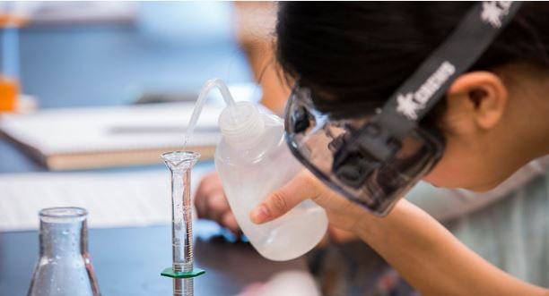 Manchester University student in lab Manchester University student in lab