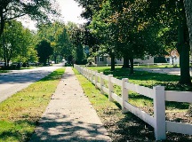 picket fences along the sidewalks