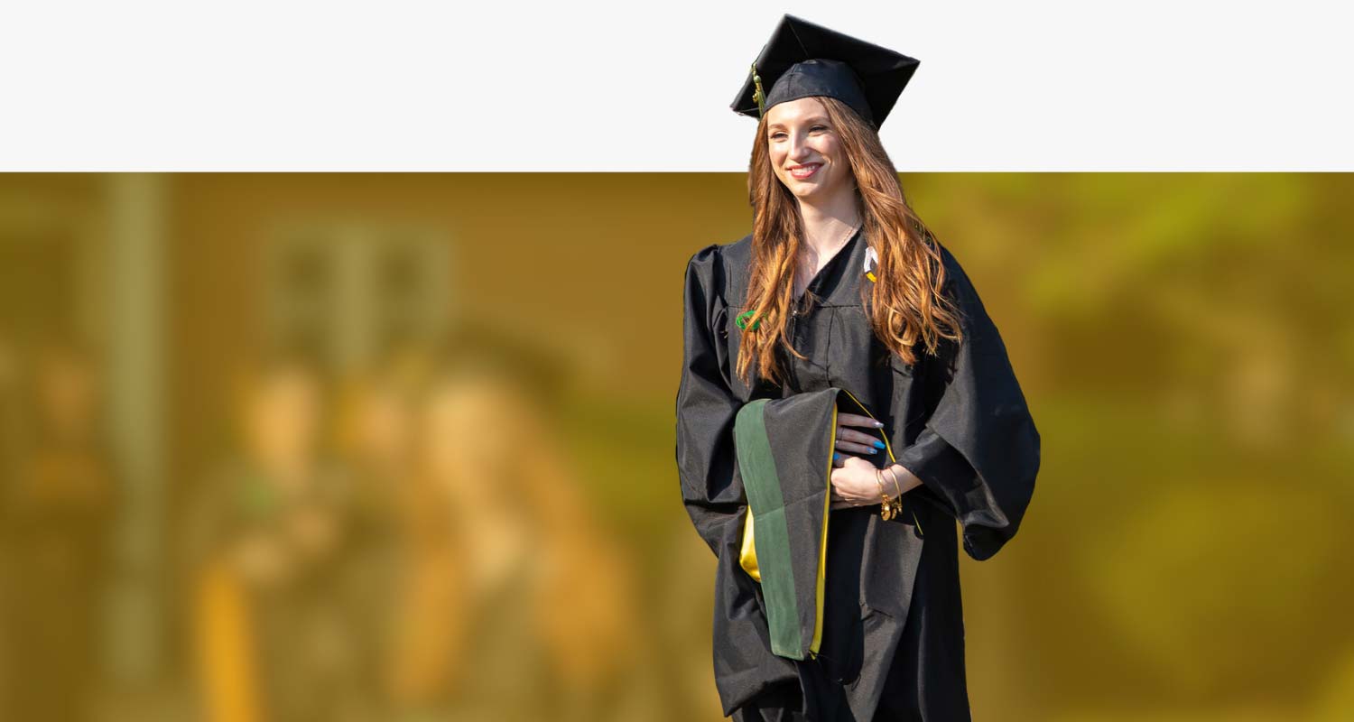 A student graduates with an MAT from MU