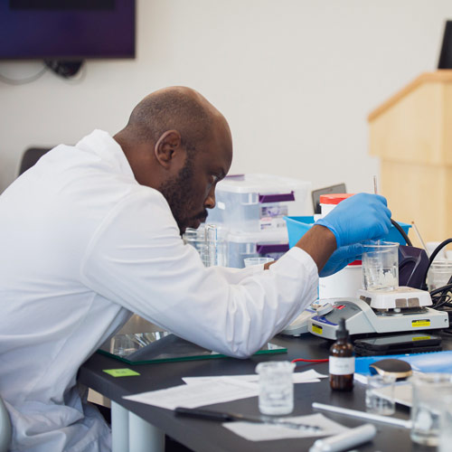 A student is seen in the MU Fort Wayne pharmacy laboratory.