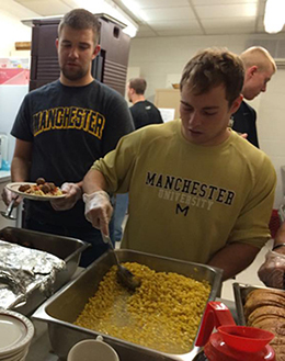 MU baseball players prepared and served meals.
