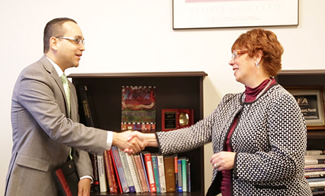 Walgreens representative Alexander Usher presented Dr. Raylene Rospond, MU vice president and dean of the MU College of Pharmacy, with a Walgreens Diversity Donation of $10,000.
