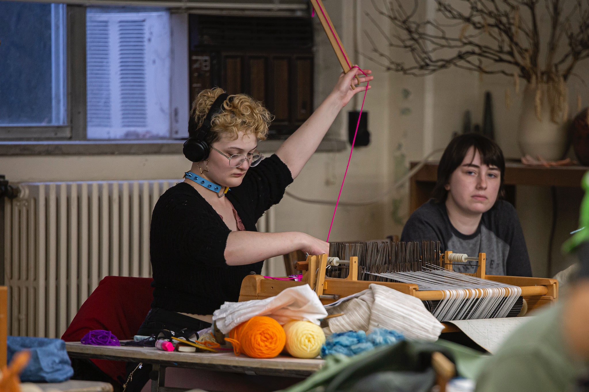 art student on loom art student on loom