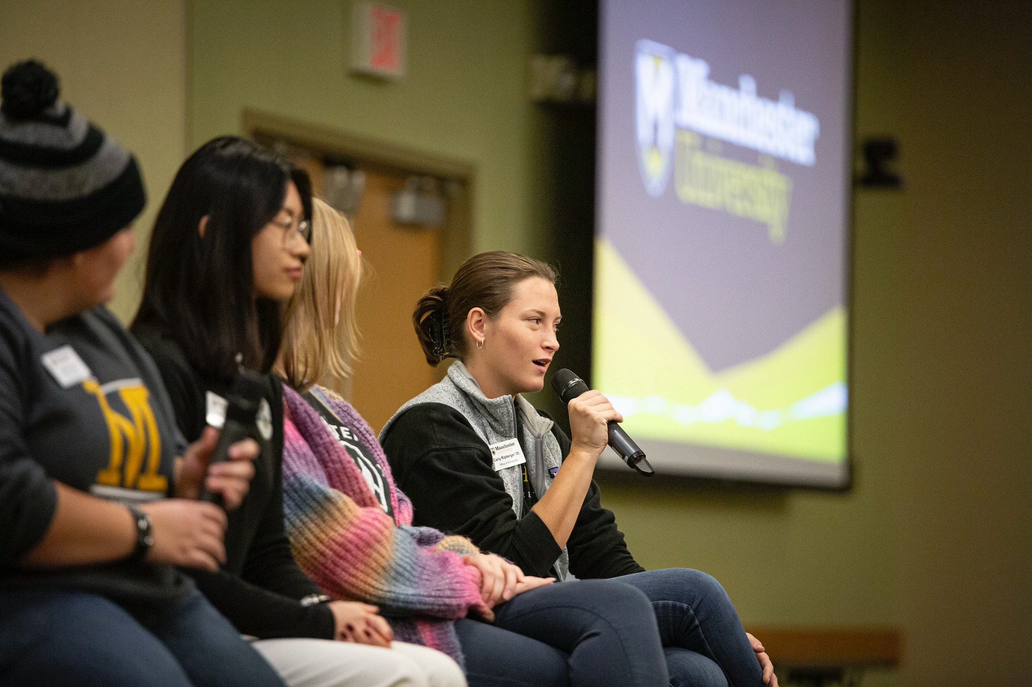 Campus Visit Day students on a panel sitting down talking on a visit day students on a panel sitting down talking on a visit day