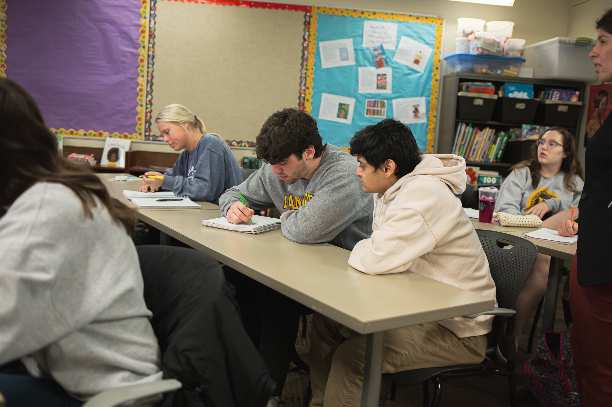 Education with students taking notes Education with students taking notes