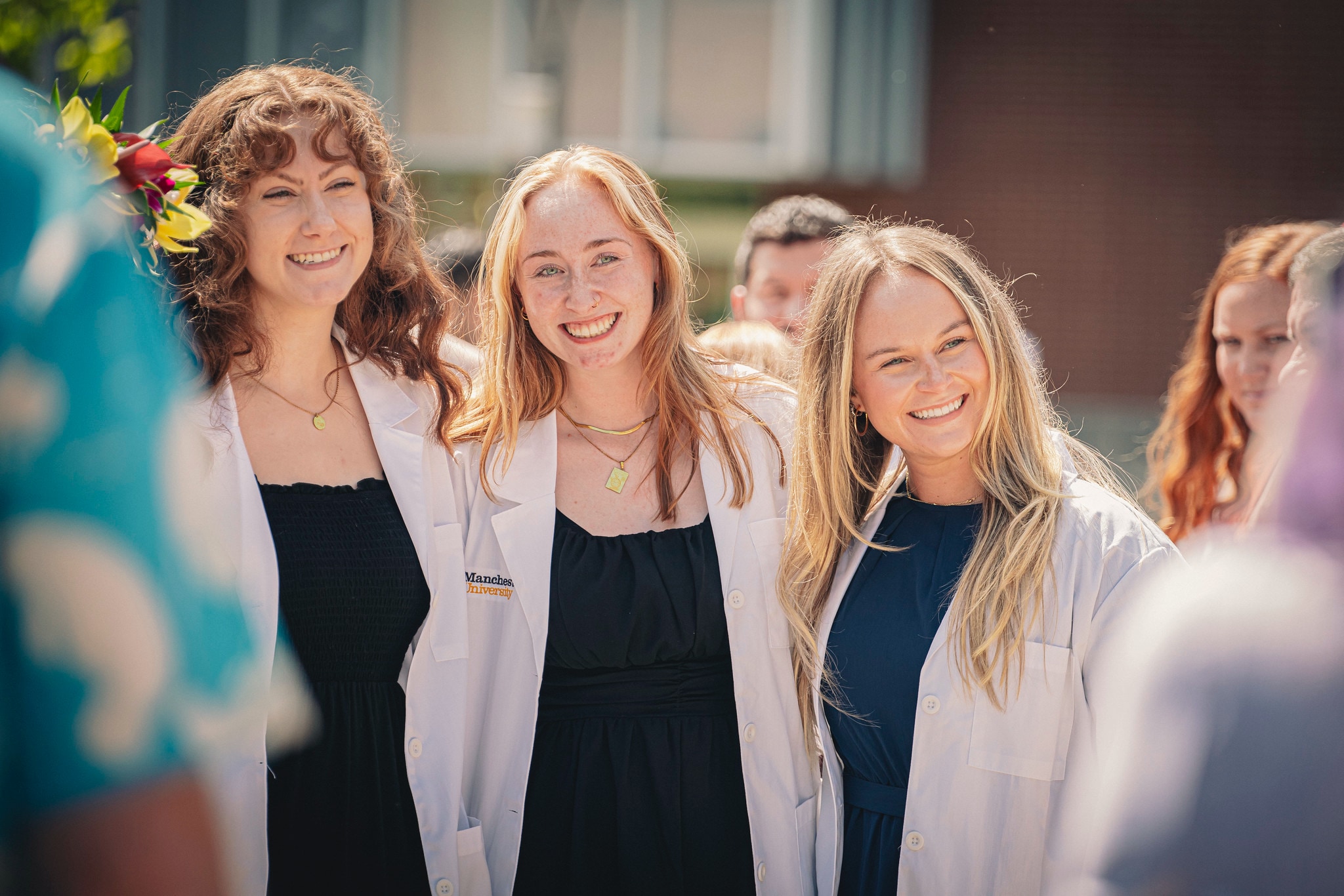 a group of female pharmacy and nursing students pose for a photo