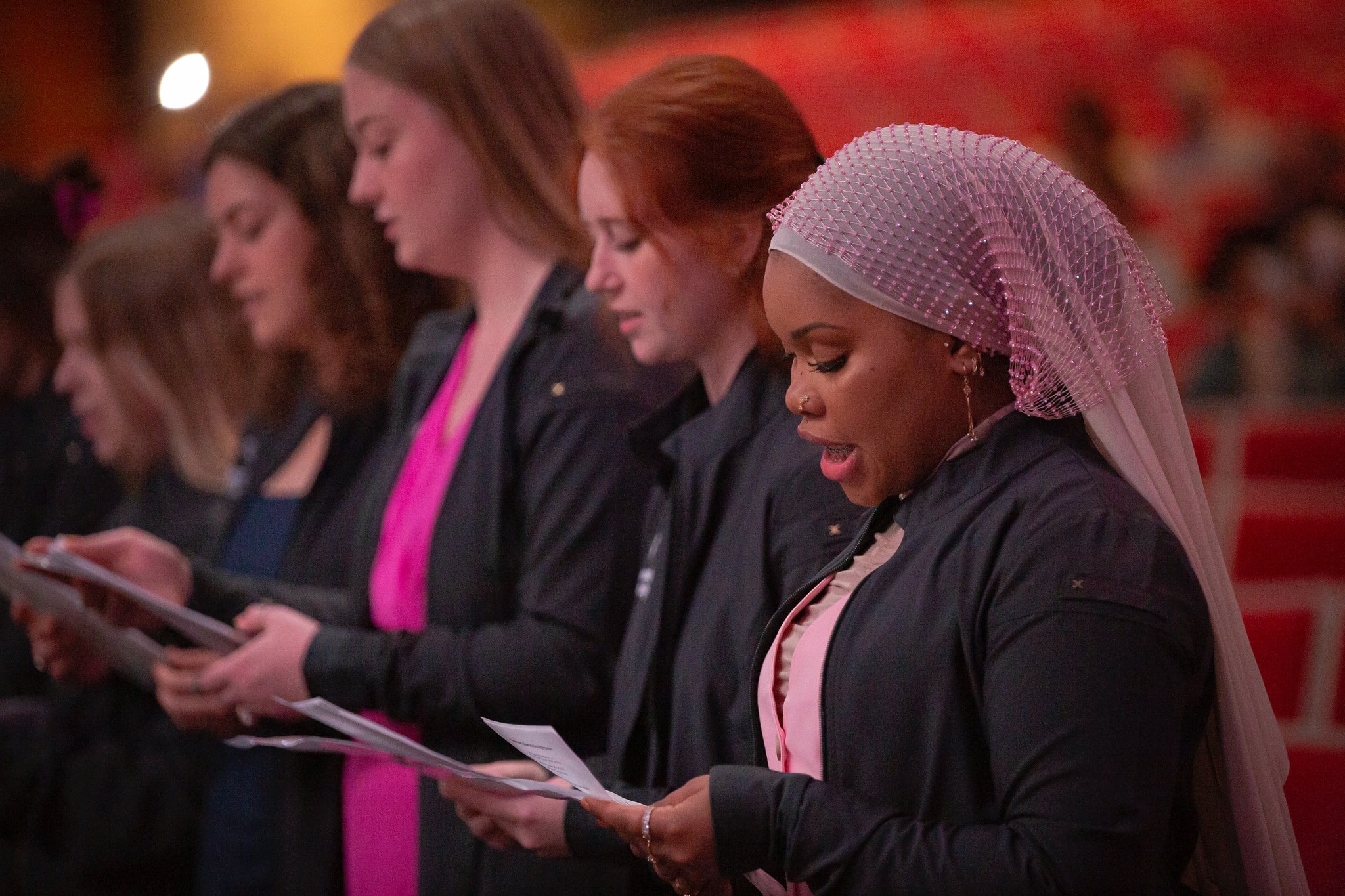 Pharm-Nursing-Ceremonies-5 a group of female pharmacy and nursing students sing a song at a nursing ceremony