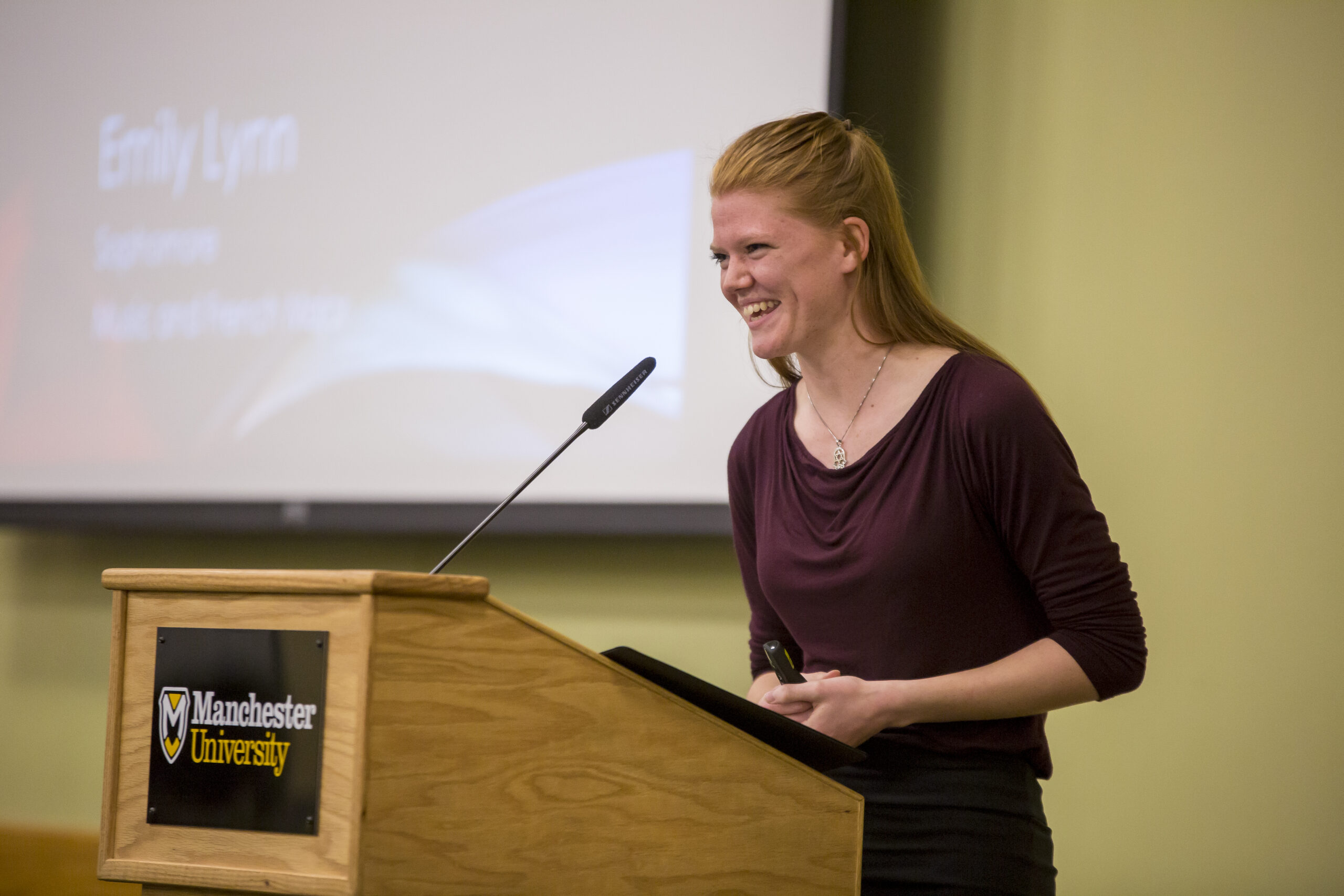 Student Symposium 2 female student at podium at the Student Symposium