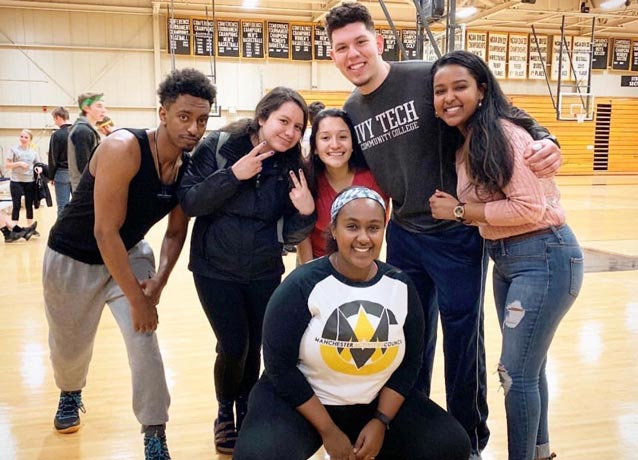 Numi and a group of friends at an event