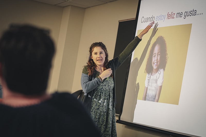 student giving a tour on a visit day outside