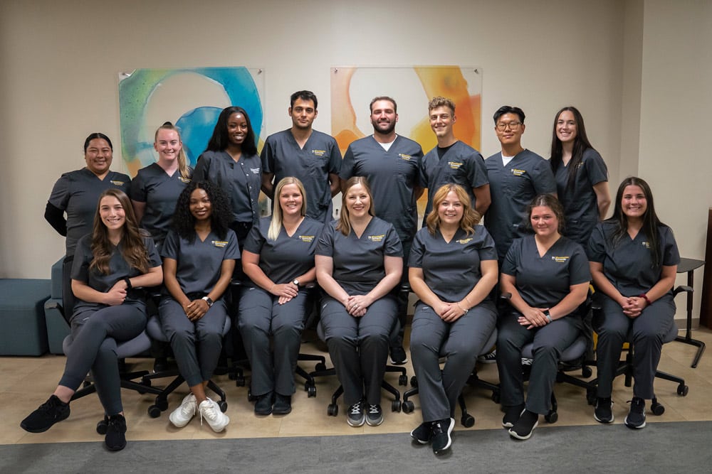 ClassPhoto Manchesters ABSN students pose together for a photo.