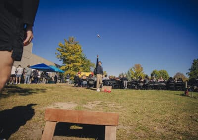 MU students playing cornhole before the homecoming football game