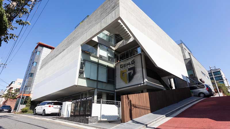 Gen G headquarters in South Korea is a grey concrete building within the downtown of Seoul.