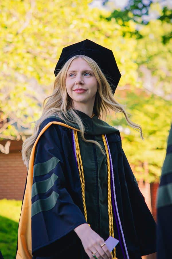 A grad student from Manchester University Fort Wayne walks the North Manchester campus.