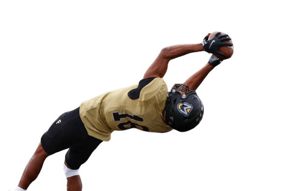 Football player leaps to catch the ball over the endzone